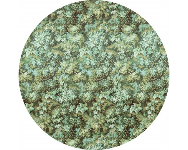 Grüne Natur mit verschiedenen Pflanzen auf einem Wandkreis für einen natürlichen Look.