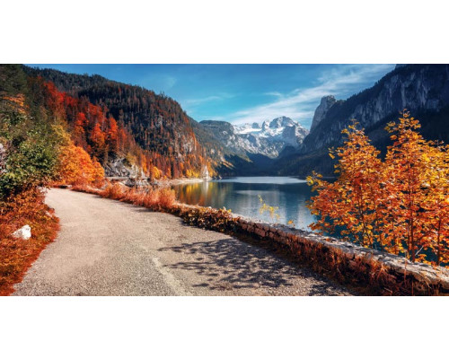 Fototapete vom Vorderen Gosausee in Österreich, mit Bergen und einem klaren See inmitten der Natur.
