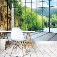 Eine Fototapete mit einem Wasserfall in einer natürlichen Landschaft, passend für ein Büro.