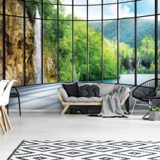 Eine Fototapete mit 3D-Blick auf eine Wasserfall-Landschaft, geeignet für verschiedene Räume.