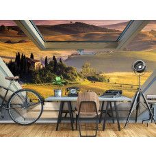 Eine Fototapete mit Blick auf eine Landschaft durch ein Dachfenster für das Büro.