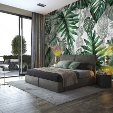 Eine botanische Fototapete mit Dschungelblättern und einem Dschungel-Stil auf dem Display im Schlafzimmer.
