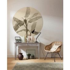 Ein Tapetenkreis mit einem Bananenstaudenmotiv, das sich ideal für ein Wohnzimmer eignet.