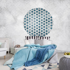 Ein Tapetenkreis mit Sechsecken in einem 3D-Effekt, sichtbar in einem Schlafzimmer.