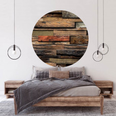 Ein Tapetenkreis mit Holzbrettern mit 3D-Effekt für ein industrielles Ambiente, das in einem Schlafzimmer zu sehen ist.