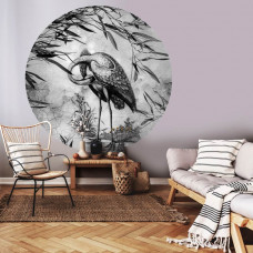 Ein Wandkreis mit einem eleganten Kranich in schwarz-weiß, perfekt für ein Wohnzimmer.