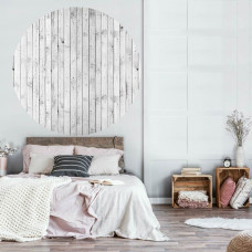 Ein Tapetenkreis mit weißen Holzregalen, industrielles Thema, sichtbar in einem Schlafzimmer.