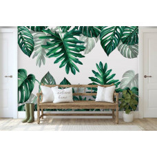 Eine botanische Fototapete mit Dschungelblättern auf dem Display im Wohnzimmer.