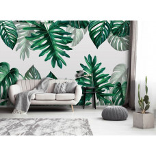 Eine botanische Fototapete mit Dschungelblättern auf dem Display im Wohnzimmer.