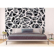 Eine Fototapete mit einem schwarz-weißen abstrakten 3D-Kunstwerk in einem Schlafzimmer.