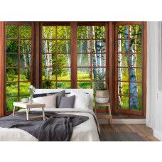 Eine Fototapete mit 3D-Fensterblick auf einen Birkenwald im Vliesbehangstil für ein Schlafzimmer.