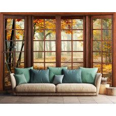 Eine Fototapete mit einer stimmungsvollen Waldlandschaft in Herbsttönen, geeignet für ein Wohnzimmer.