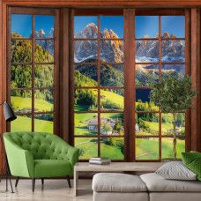 Eine Fototapete mit 3D-Fensteransicht der Alpen mit beeindruckender Bergkulisse in einem modernen Wohnzimmer.