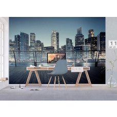 Ein Büro mit einem Fototapet von der 3D-Aussicht auf Wolkenkratzer in einer beleuchteten Stadt.