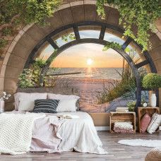 Eine Fototapete mit einer 3D-Ansicht einer Strandlandschaft bei Sonnenuntergang, ideal für ein Kinderzimmer.