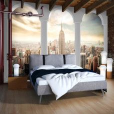 Eine Fototapete mit einer 3D-Ansicht von New York mit Säulen, geeignet für ein Schlafzimmer.