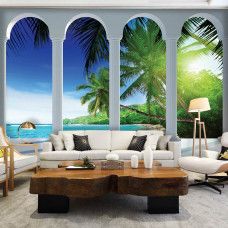 Eine Fototapete mit einem tropischen Strand mit Säulen, passend für ein Wohnzimmer.