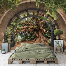 Eine Fototapete mit einer künstlerischen Ansicht eines Märchenbaums, perfekt für ein Schlafzimmer.