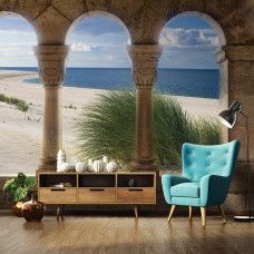 Eine Fototapete mit einer 3D-Ansicht eines Strandes mit Dünen und Meer, perfekt für ein Büro.