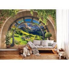 Eine Fototapete mit einer Berglandschaft in Tirol, bedruckt auf Vliesbehang, passend für ein Wohnzimmer.