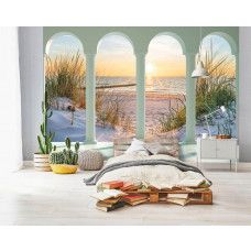 Eine Fototapete mit 3D-Blick auf die Dünen, den Strand und das Meer in einem bunten Kinderzimmer.