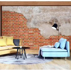 Eine industrielle Fototapete von einer roten Ziegelwand mit Betonelementen im Wohnzimmer.