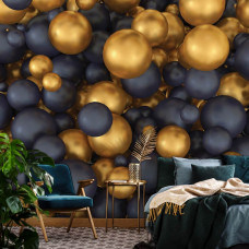 Fototapete im Schlafzimmer mit 3D-Kugeln in Gold und Schwarz für eine stimmungsvolle und stilvolle Wandgestaltung.