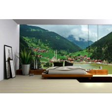 Eine Fototapete mit einer Berglandschaft mit Natur und Bergen für das Schlafzimmer.