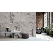 Eine Fototapete mit Beton-Sechsecken für einen industriellen Look im Wohnzimmer.
