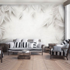 Fotobehang met ton-sur-ton bladstructuren in een moderne woonkamer.