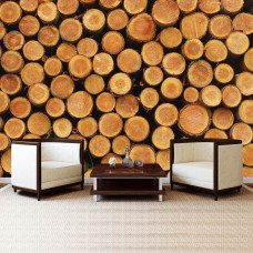 Eine Fototapete mit Baumstämmen vor einem neutralen Hintergrund.