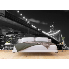 Eine Fototapete der Brooklyn Bridge bei Nacht in New York für das Schlafzimmer.