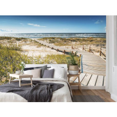 Fototapete Brücke durch die Dünen mit Blick auf den Strand und das Meer als Vliestapete für ein Schlafzimmer.