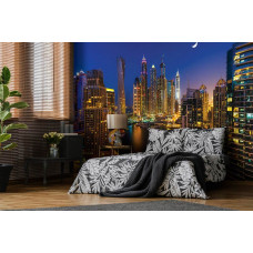 Eine Fototapete von den Wolkenkratzern in Dubai bei Nacht für das Schlafzimmer.