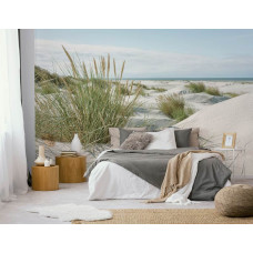 Fototapete „Dünen an der Küste“ in einem Schlafzimmer mit sanften Sandhügeln, weichem Strandhafer und hellem Küstenlicht für eine beruhigende Ausstrahlung.