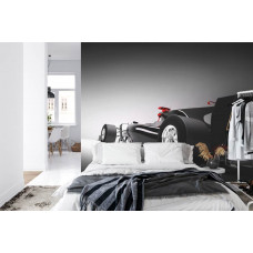 Eine Fototapete eines dynamischen Formel-1-Autos in einem actiongeladenen Schlafzimmer.