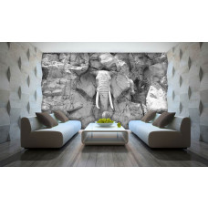 Eine Fototapete mit einem in Felsen geschnitzten Elefanten in einem abstrakten und künstlerischen Design, Grautöne.