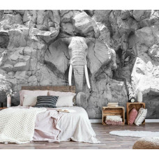 Eine Fototapete mit einer Elefantenskulptur in Felsen, ideal für ein ruhiges Schlafzimmer.