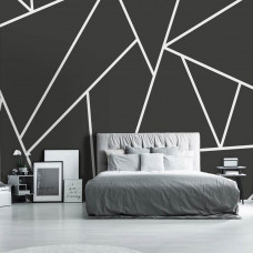 Eine Fototapete mit geometrischen Dreiecken mit abstrakten Linien in einem Schlafzimmer.