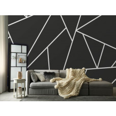 Eine Fototapete mit geometrischen Dreiecken in einem trendigen Wohnzimmer.
