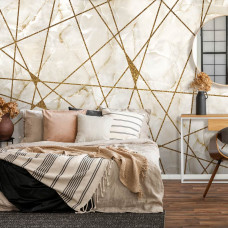Eine Fototapete mit goldenem Marmor im luxuriösen Look, perfekt für ein Schlafzimmer.