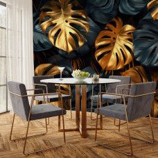 Fototapete mit goldenen Monstera Blättern im Jungle Stil in der Küche.