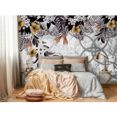 Eine verschnörkelte Fototapete mit goldenen Pflanzen auf einer Betonwand, gesehen im Schlafzimmer.