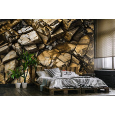 Eine Fototapete mit goldenen Felsen und Steinen im industriellen Stil für das Schlafzimmer.