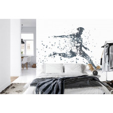 Eine Fototapete mit einer grafischen Darstellung eines Fußballers in Aktion in einem Schlafzimmer.