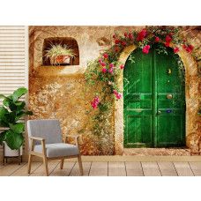 Fotobehang met een groene deur in Toscane, omgeven door een Provençaalse sfeer