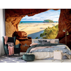 Fototapete mit Blick auf den Strand und die Dünen aus einer Höhle für das Schlafzimmer.