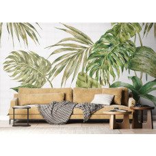 Ein Fototapete mit großen grünen Blättern im Wohnzimmer, bei dem das botanische Design eine frische und beruhigende Atmosphäre schafft.