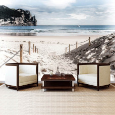 Eine Fototapete von einem Strandweg, der zum Meer führt, sichtbar in einem Wohnzimmer.