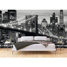 Eine Schwarz-Weiß-Fototapete der kultigen Brooklyn Bridge in New York City in einem Schlafzimmer.